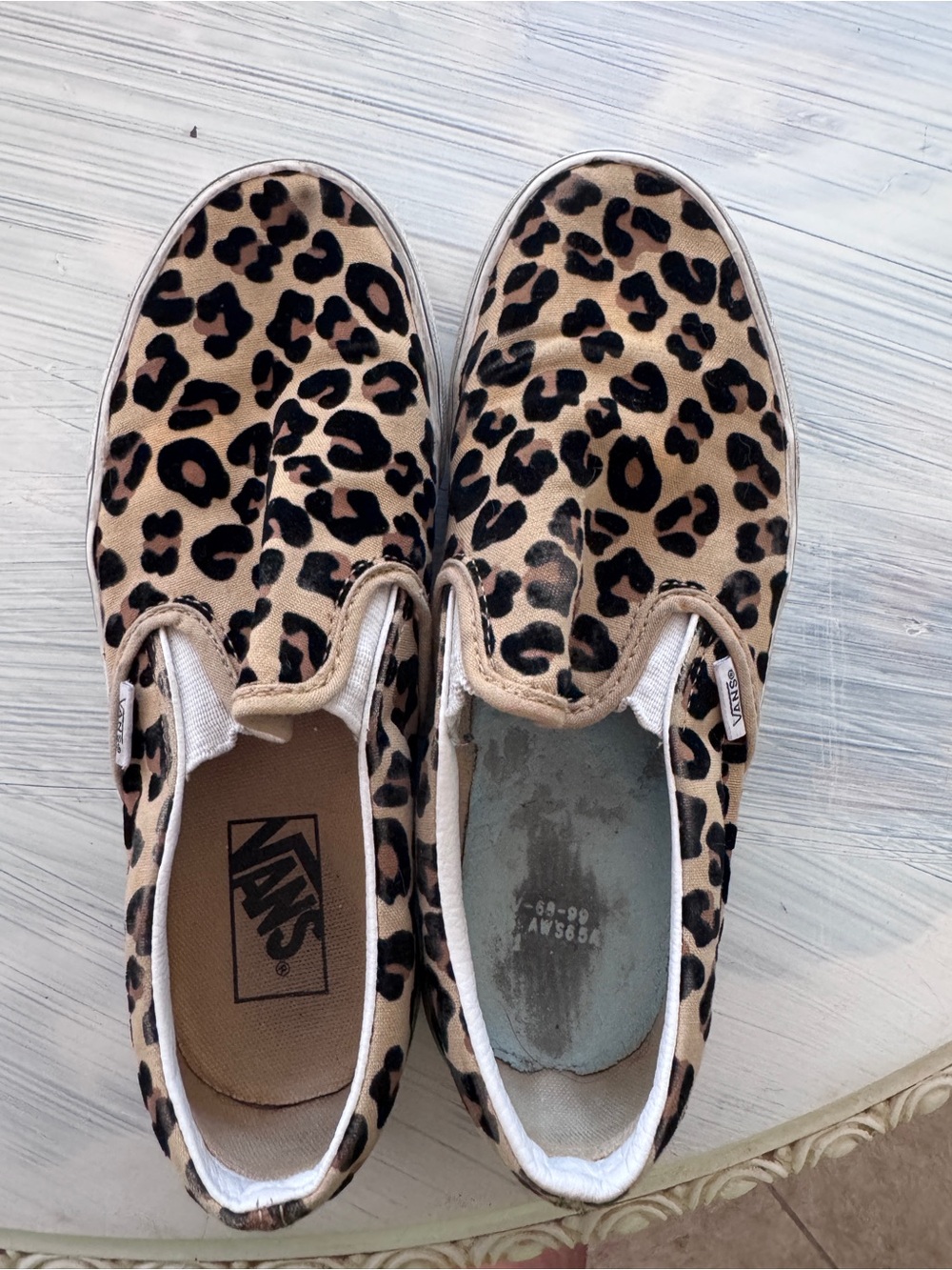 Vans Leopard Print Slip-On Sneakers in Tan and Black